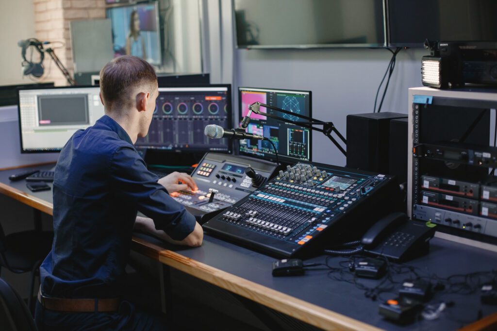 sound-engineer-working-studio-with-equipment